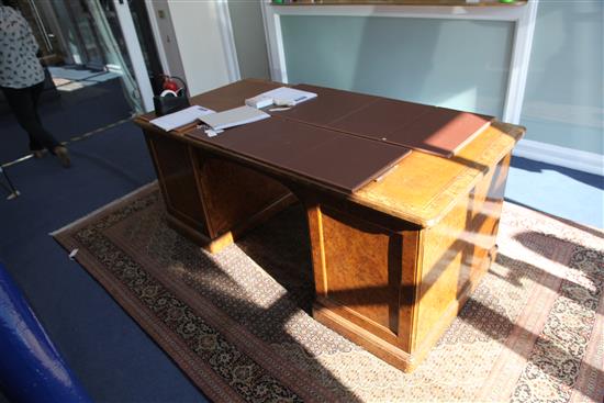 A Victorian burr walnut partners pedestal desk, by Holland & Sons, W.6ft